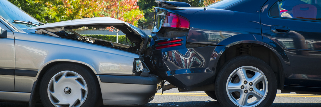 Rear end accident between two cars. Call our Durham auto accident attorney today.